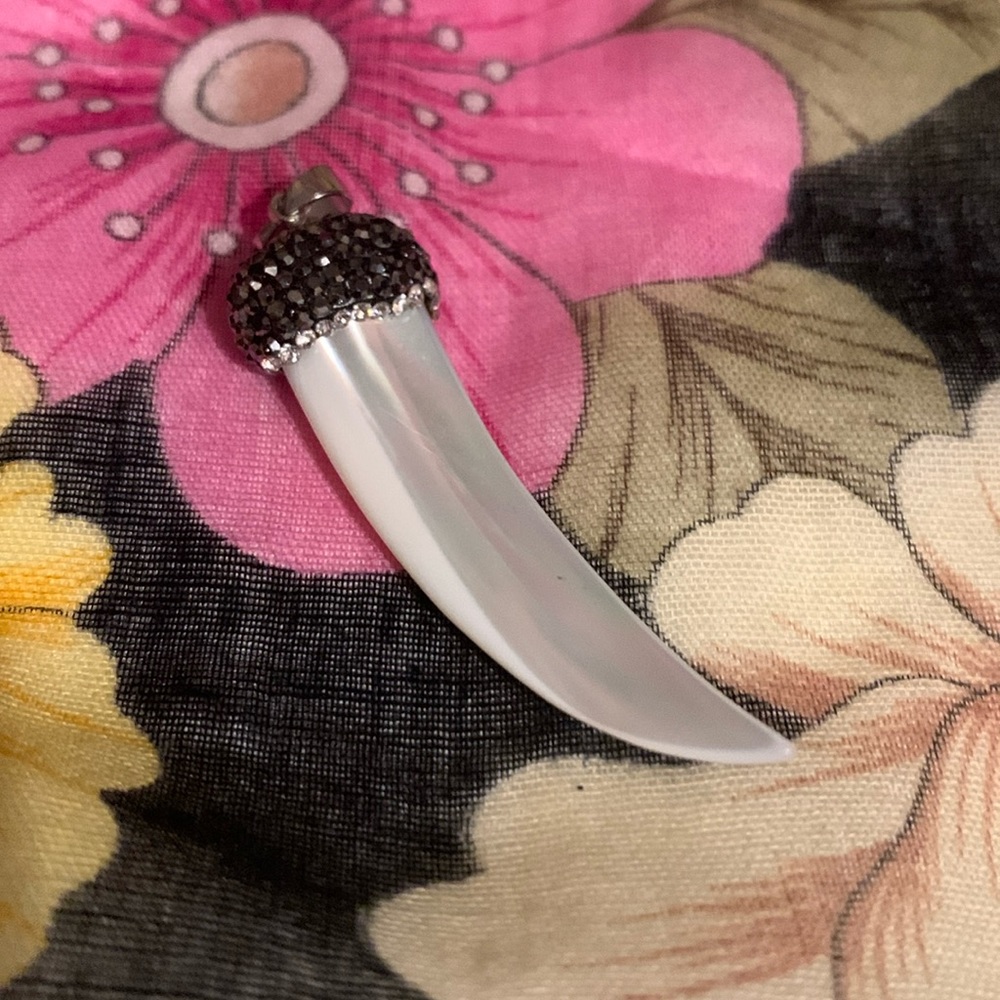 Beautiful Pendant looks like made of Pearl/ Stones